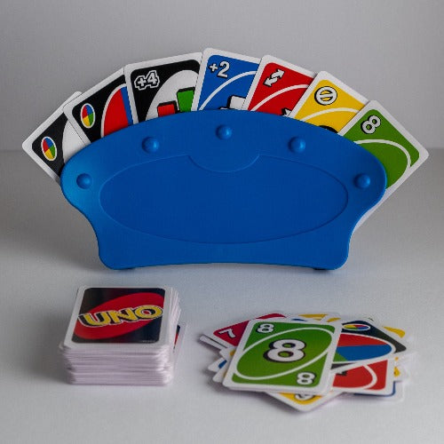 These card holders are helpful for people who have difficulty holding playing cards. They are designed to be free standing on a tabletop or to fit comfortably in your hand. They hold up to 15 cards securely, while allowing cards to be easily removed or inserted. They have a no-slip felt grip inside and expand to comfortably hold even the thickest cards.