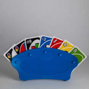 These card holders are helpful for people who have difficulty holding playing cards. They are designed to be free standing on a tabletop or to fit comfortably in your hand. They hold up to 15 cards securely, while allowing cards to be easily removed or inserted. They have a no-slip felt grip inside and expand to comfortably hold even the thickest cards.