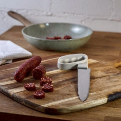 chefs knife with smooth blade and ergonomic handle. perfect for those with weak grip, limited hand function and dexterity. Part of the reflex range, easy grip handle counter balances the weight of the blade making it easy to use.